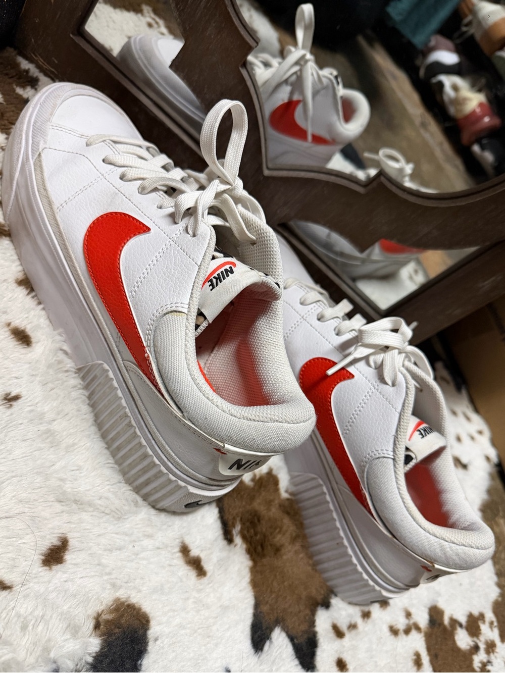 Nike White Low-Top Sneakers with Red Swoosh